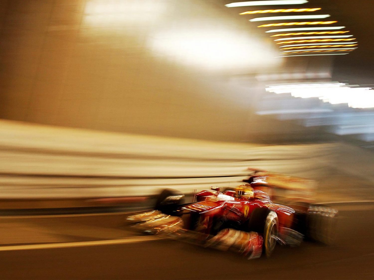 Web design of a Ferrari F1 car with a blurred background