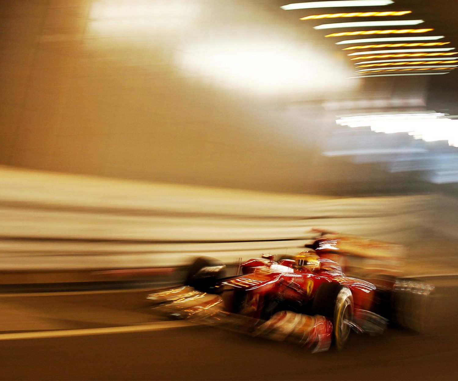 Web design of a Ferrari F1 car with a blurred background