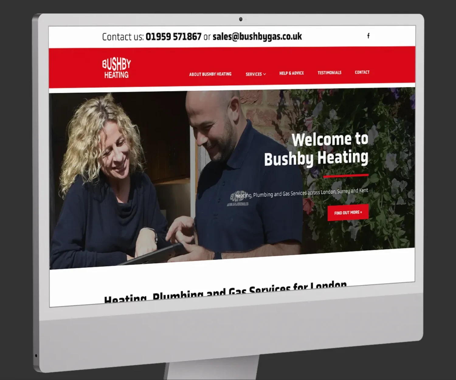 Bushby Heating website homepage displayed on an iMac.