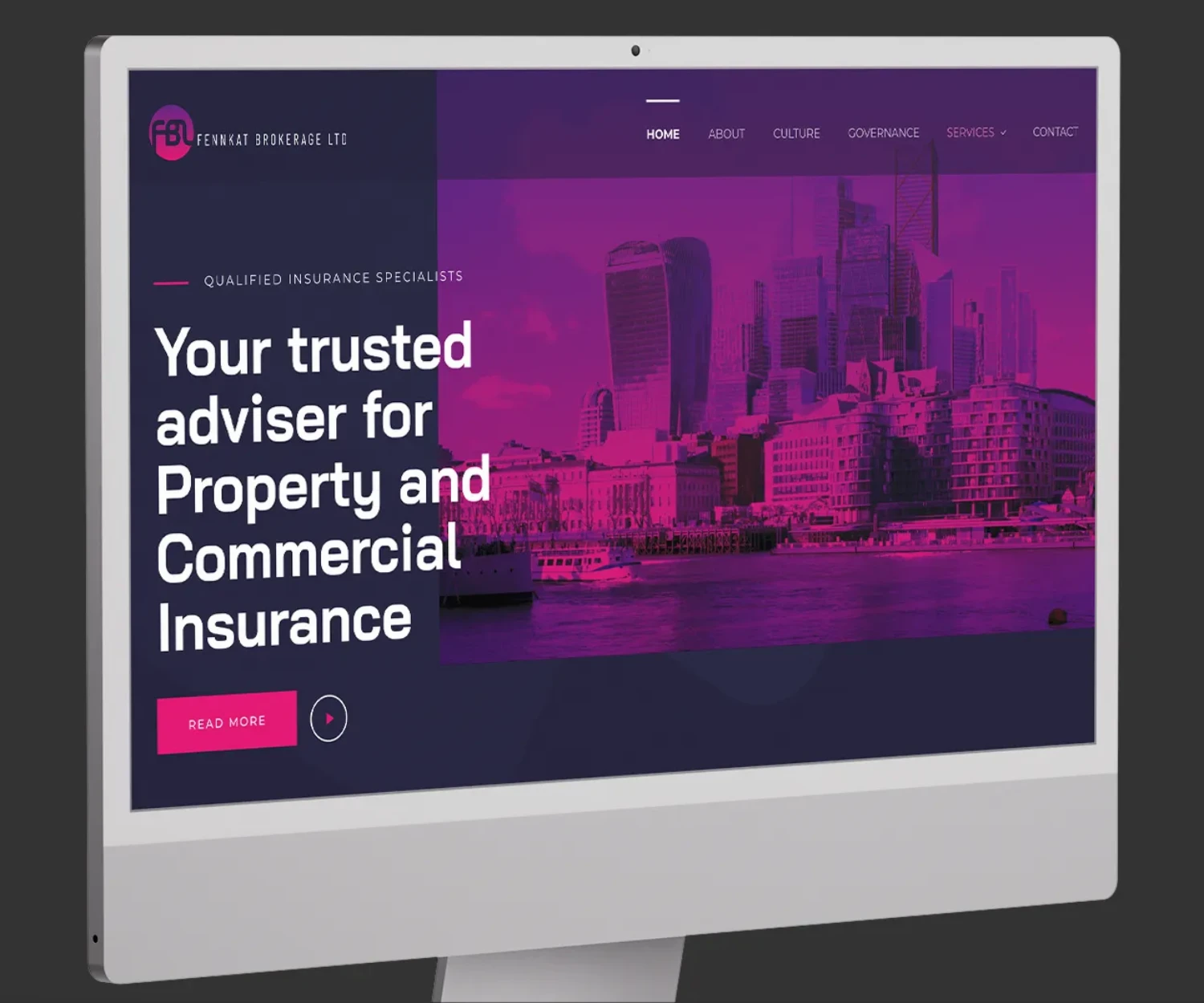 Fennkat Brokerage website homepage displayed on an iMac.